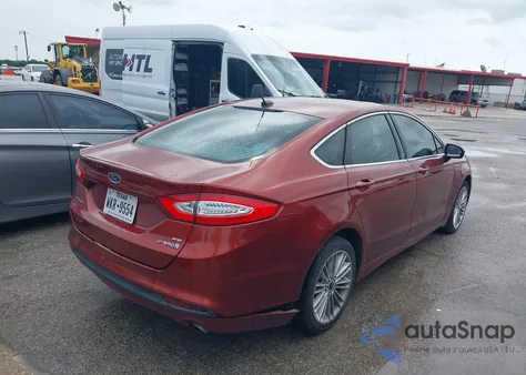 2014 Ford Fusion Hybrid Se z USA, uszkodzony, nr VIN 3FA6P0LU7ER376633
